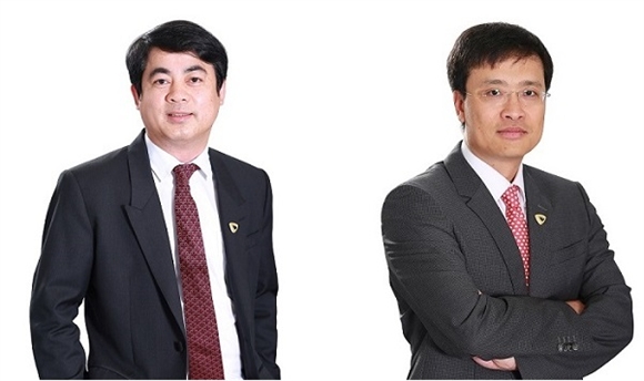 Tân Chủ tịch VCB Nghiêm Xuân Thành (trái) và Tân Tổng giám đốc VCB Phạm Quang Dũng (phải).