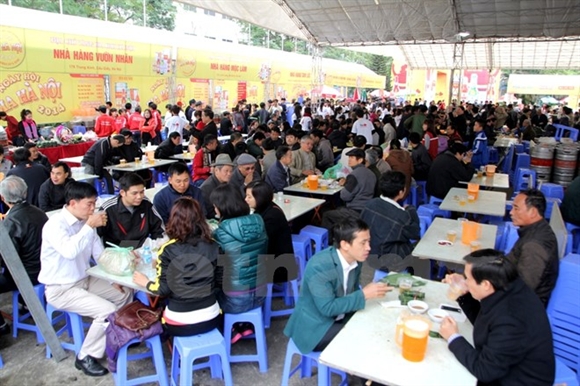 Rất đông người đến Ngày hội mặc giá rét. (Ảnh: Minh Sơn/Vietnam+)