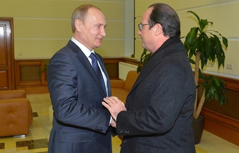 Tổng thống Pháp Hollande và Tổng thống Nga Putin trong cuộc hội đàm tại Moscow về khủng hoảng Ukraine. Ả