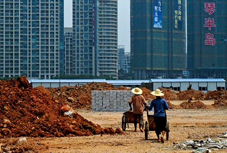 chính phủ Trung Quốc sẽ hạ mục tiêu tăng trưởng kinh tế và lạm phát năm 2015 xuống các mức tương ứng 7% và 3%